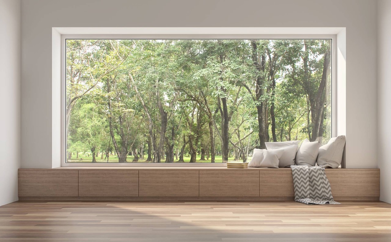 A large uncovered window in a home near Traverse City, MI