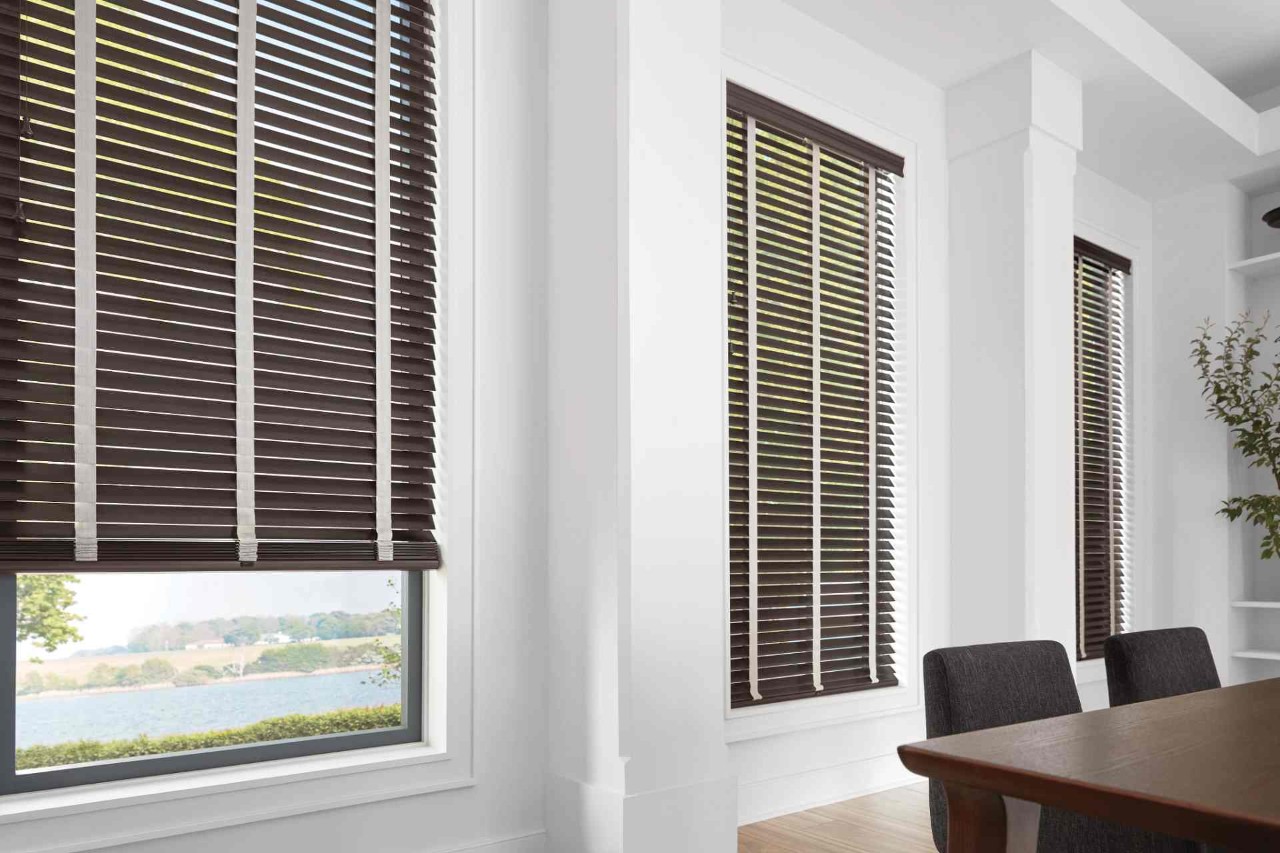 Custom wood blinds in a dining room near Traverse City, MI.